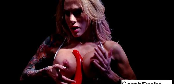  Tattooed MILF Sarah stuffs her pussy with a red toy